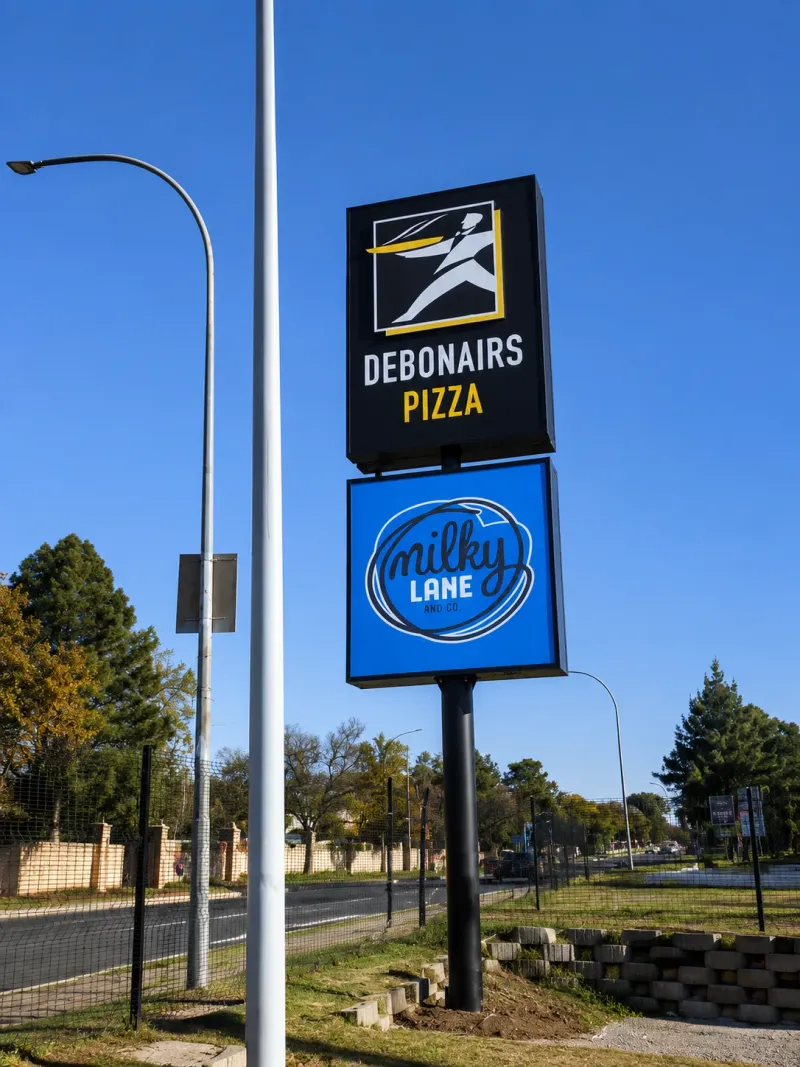 Debonairs Pizza pylon signage manufactured and installed by Sign Image — project photo 8