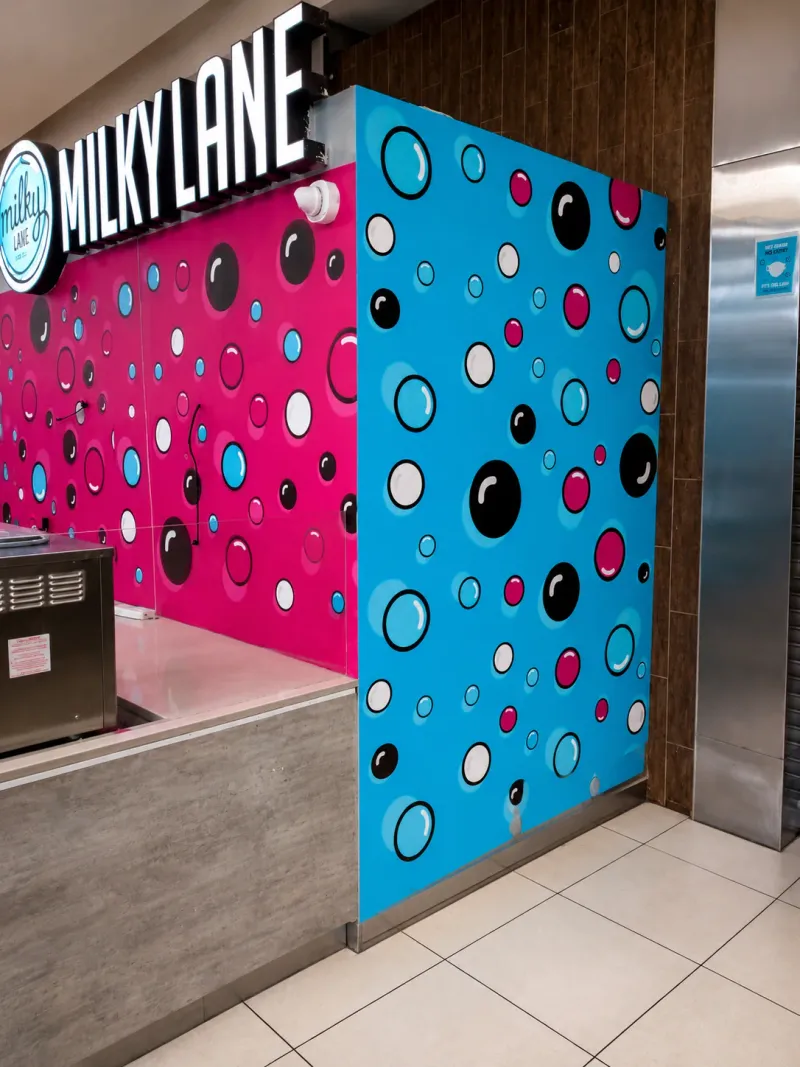 Milky Lane branded wallpaper and mural graphics and 3D fabricated sign manufactured and installed by Sign Image — project photo 2