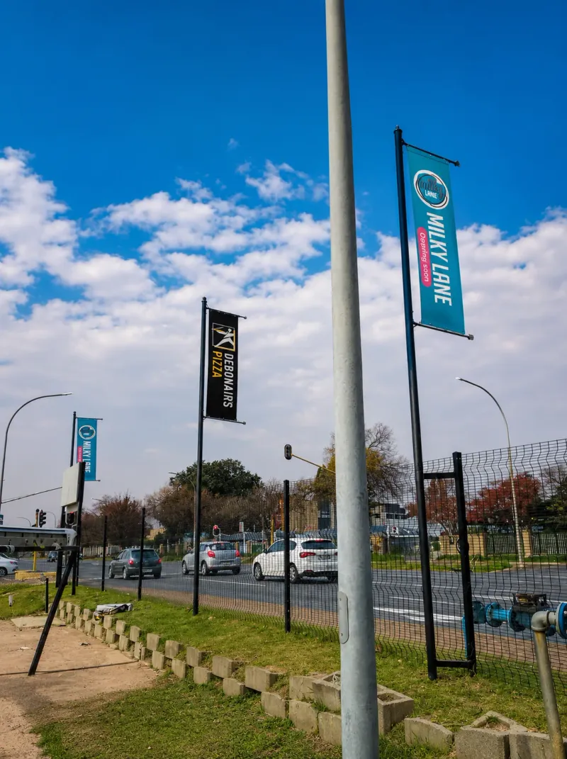 Milky Lane branded flags and outdoor display manufactured and installed by Sign Image — project photo 4