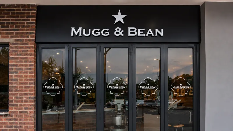 Mugg & Bean window and frosted decal graphics and 3D fabricated sign manufactured and installed by Sign Image — project photo 8