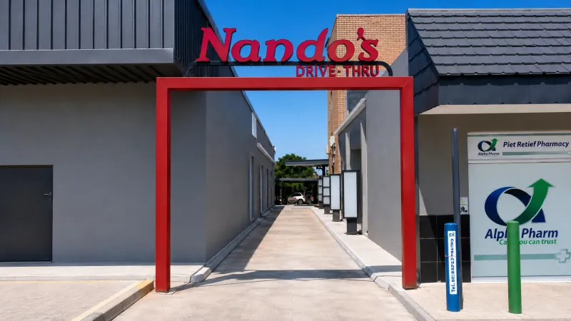 Nando’s wayfinding and directional signage manufactured and installed by Sign Image — project photo 14