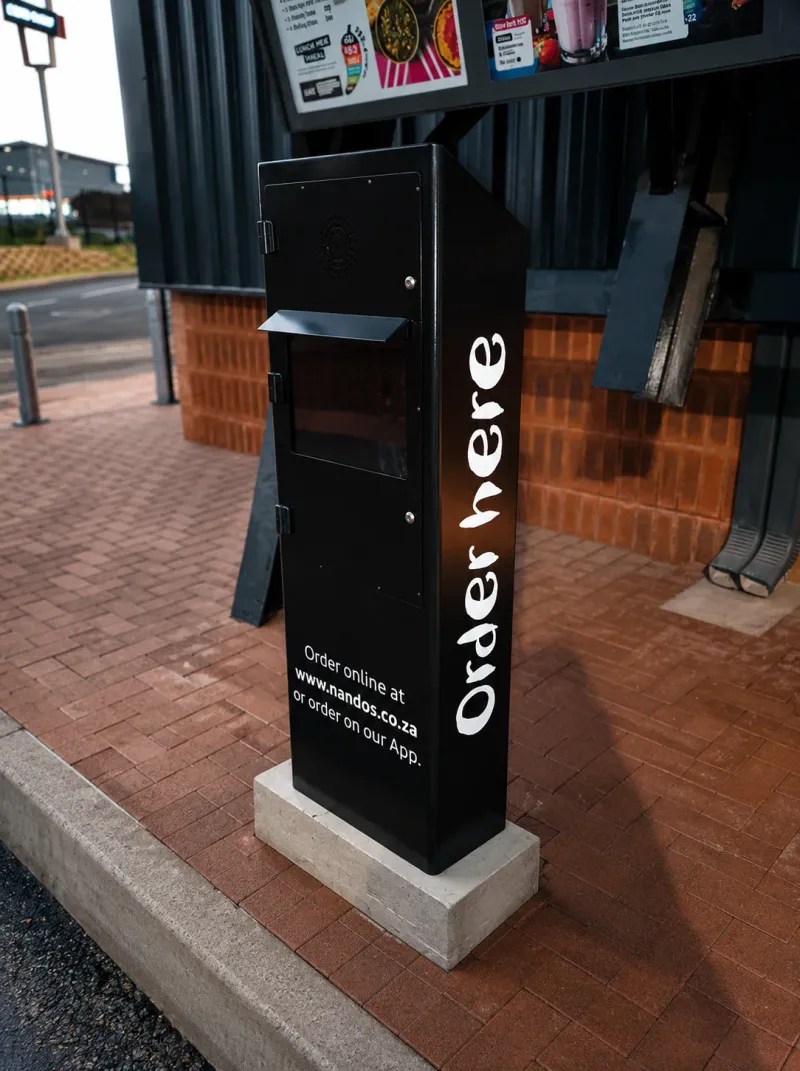 Nando’s wayfinding and directional signage manufactured and installed by Sign Image — project photo 22