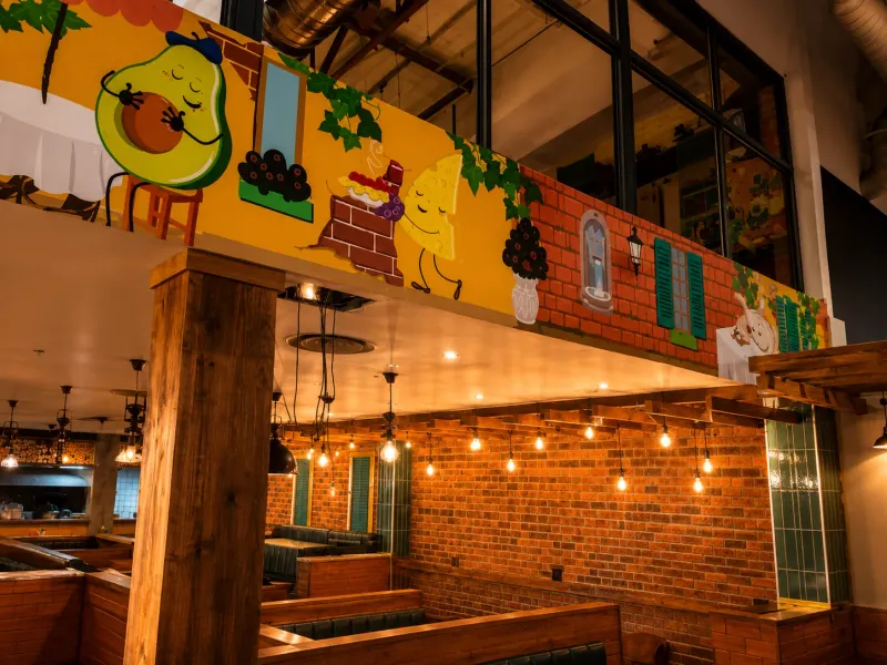 Panarottis branded wallpaper and mural graphics manufactured and installed by Sign Image — project photo 3