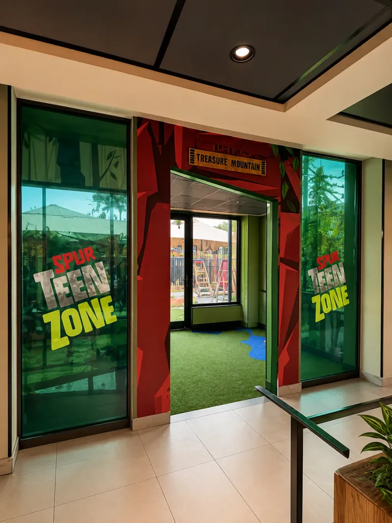 Spur Steak Ranches branded wallpaper and mural graphics manufactured and installed by Sign Image — project photo 7