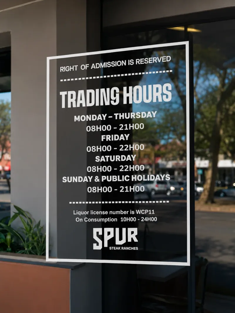 Spur Steak Ranches window and frosted decal graphics manufactured and installed by Sign Image — project photo 22